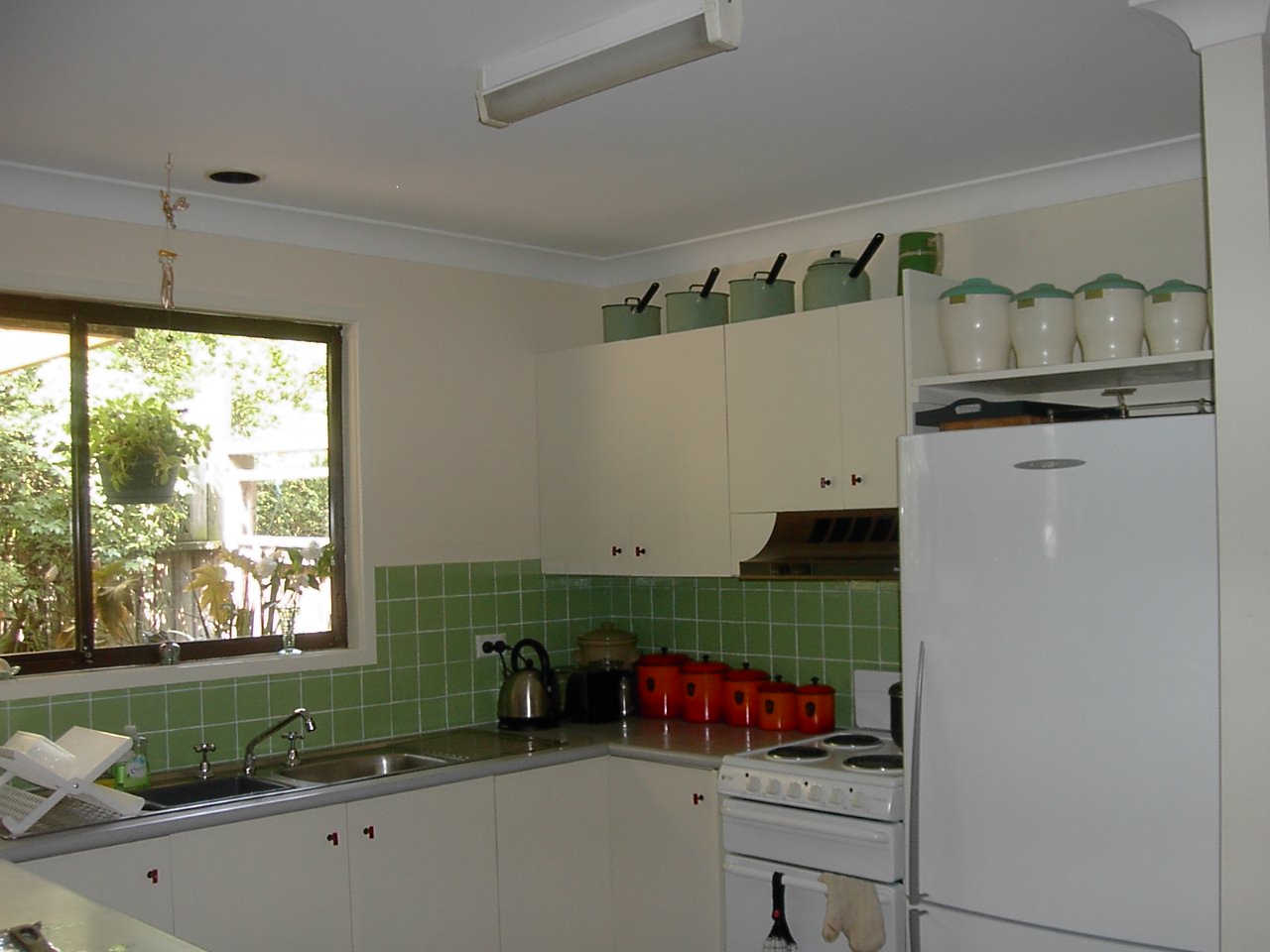 Vintage Style Kitchen with Green Tiles